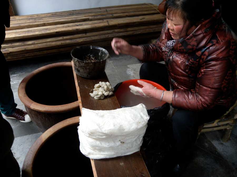 one of the museums, silk making in action