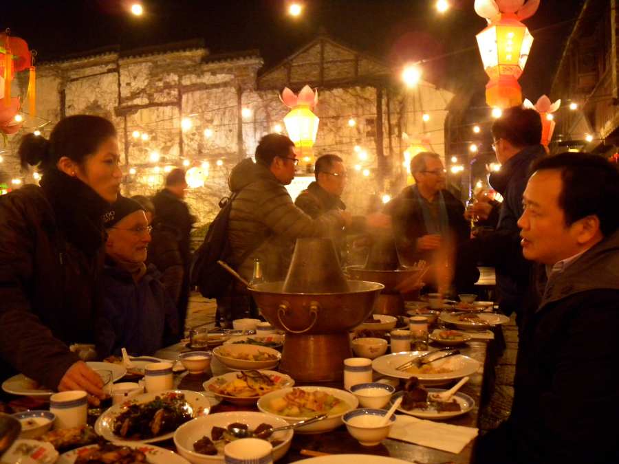 dinner in the street with the client/important Wuzhen boss. Filmed by CCTV as part of their usual spring festival coverage