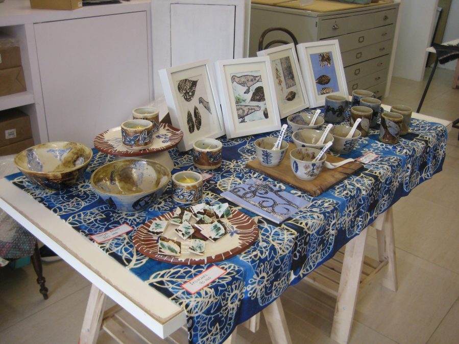 table looking a little bare but that's good as it means work has sold