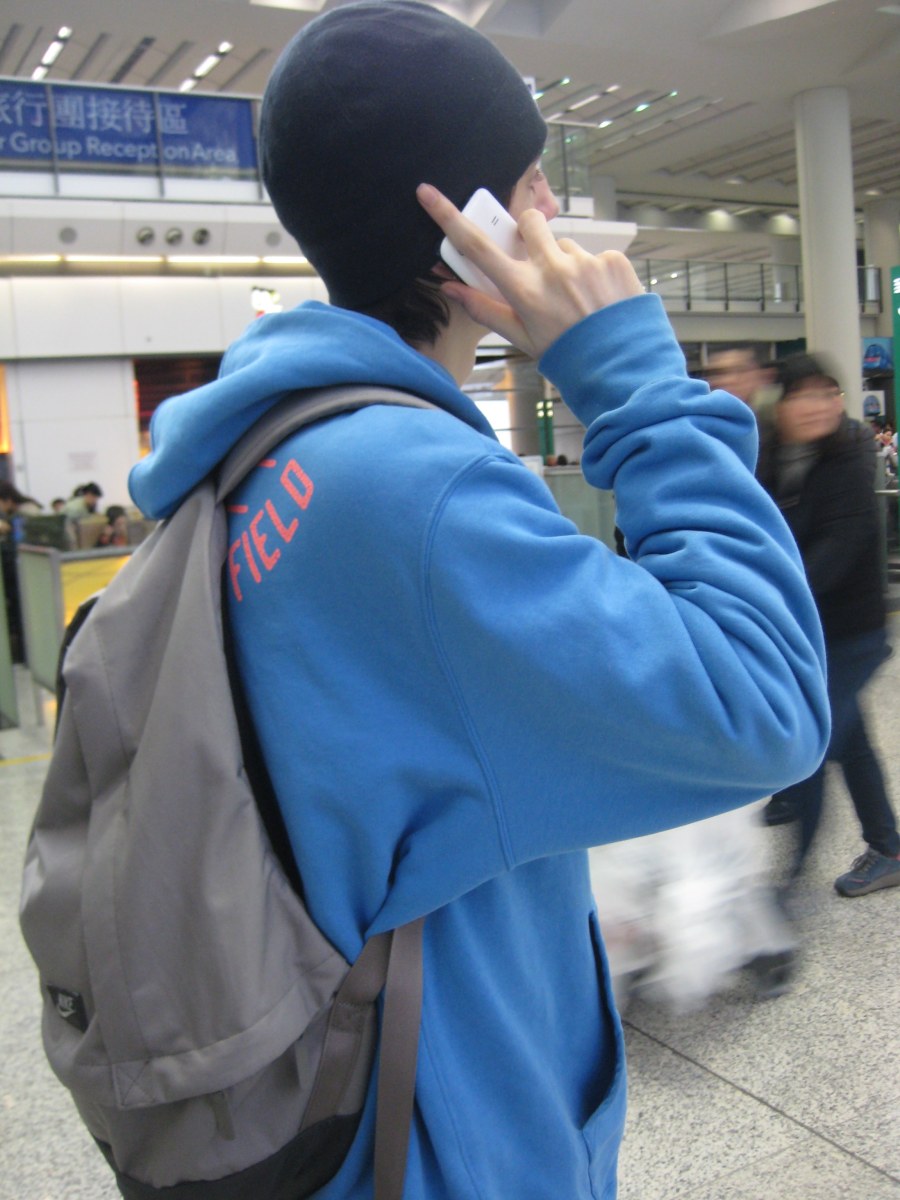 on phone - making plans to meet up with old pals