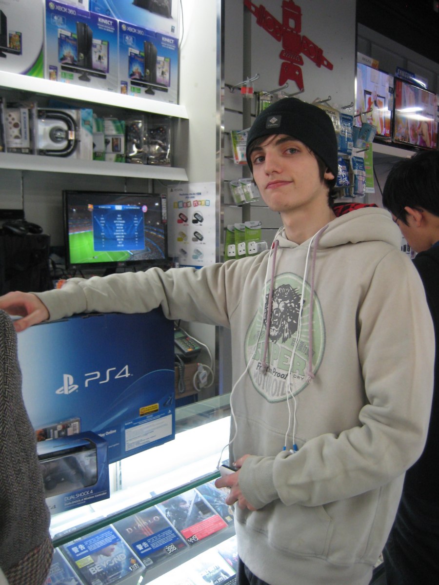 Lucien with christmas and birthday present, way to produce a him smile