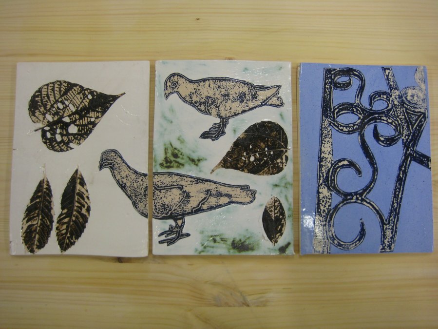 tiles mono-printed with Hong Kong pigeons and gate detail 