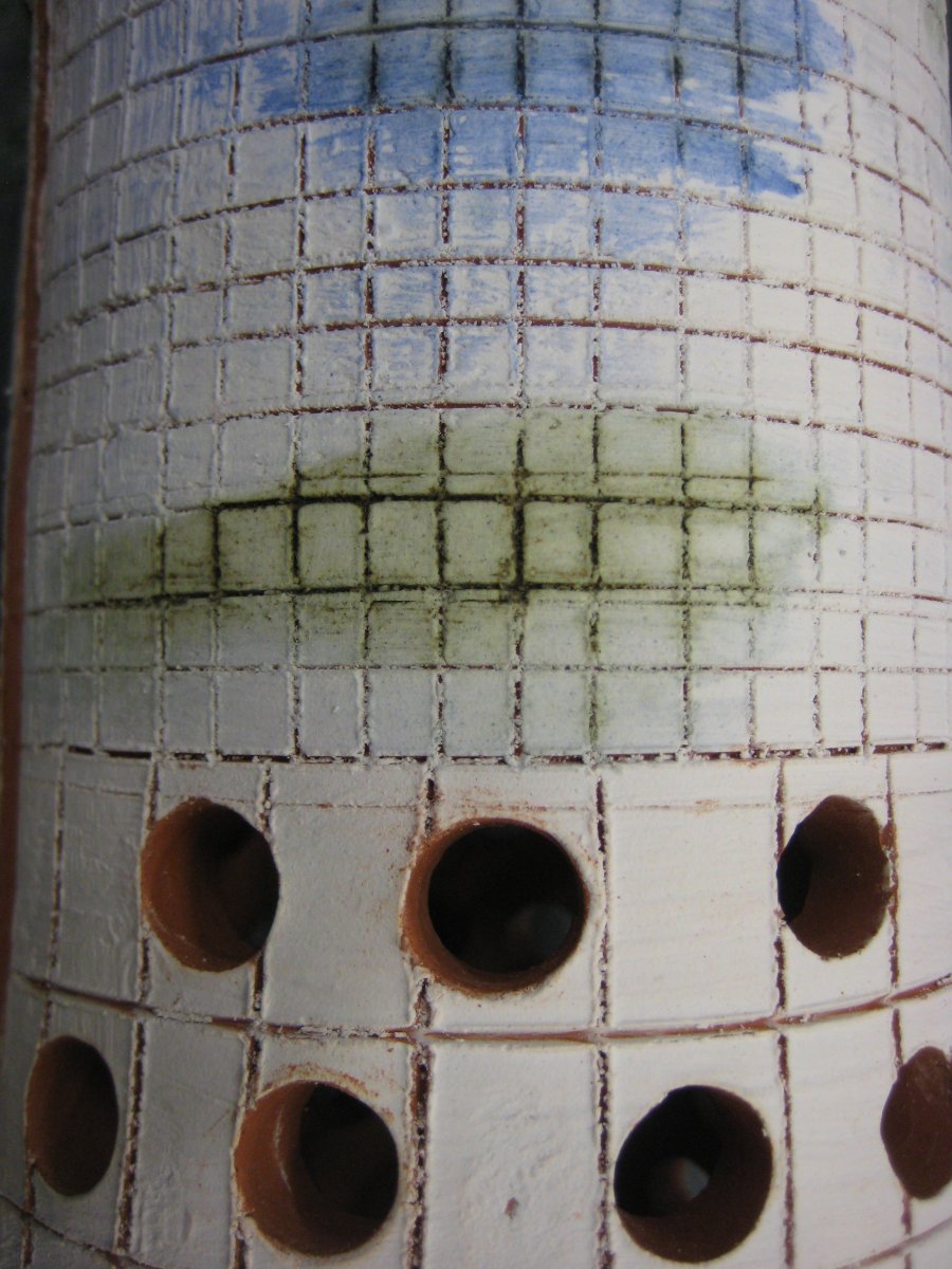 scraffito, pierced holes