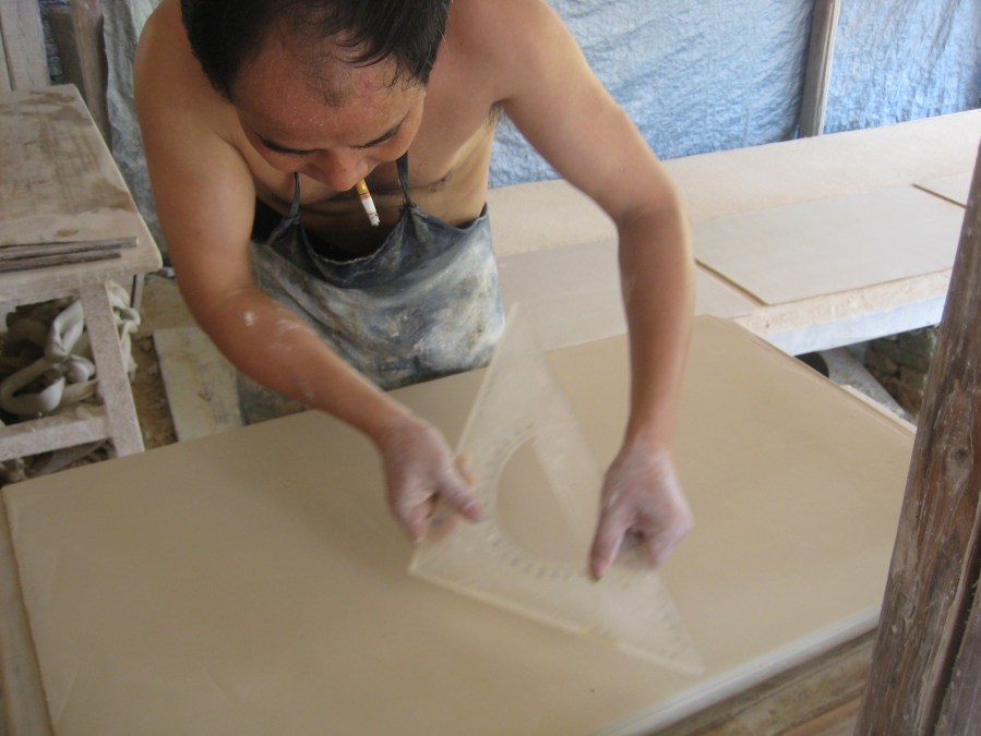 making tiles, cigarette essential