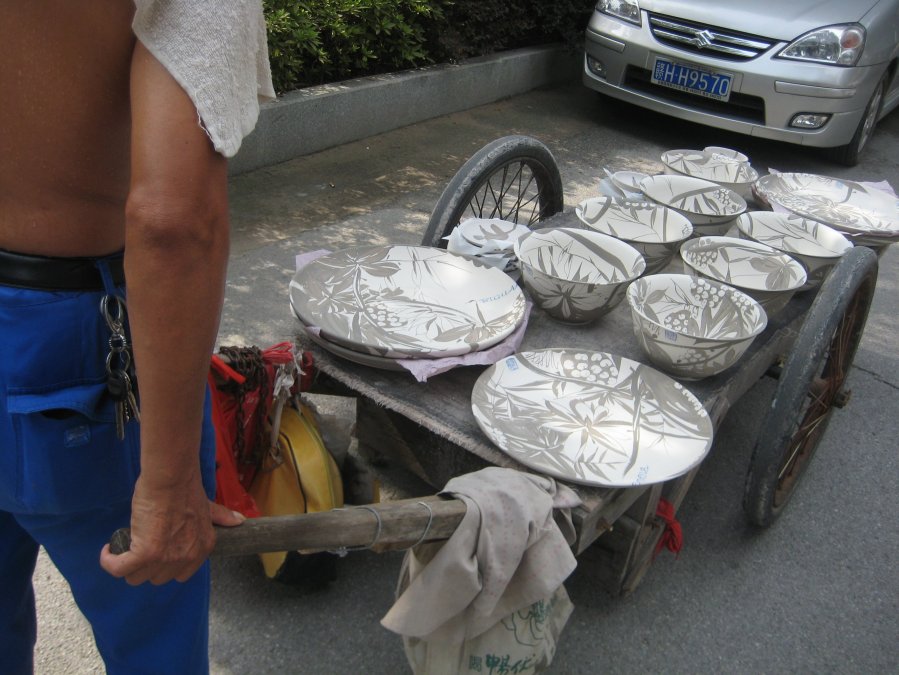 moving pots [yes unfired] by manual labour