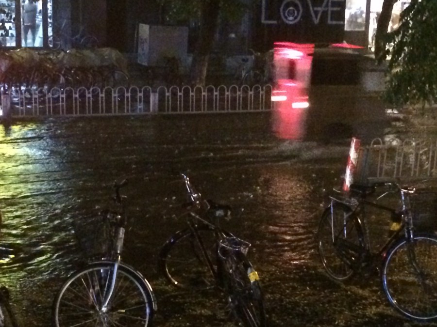 dramatic thunderstorm - an hour of continuous lightning, localised ankle deep flooding and amongst it all an army of drain unblockers and people with suction machines ensured the city traffic halted for the merest second only